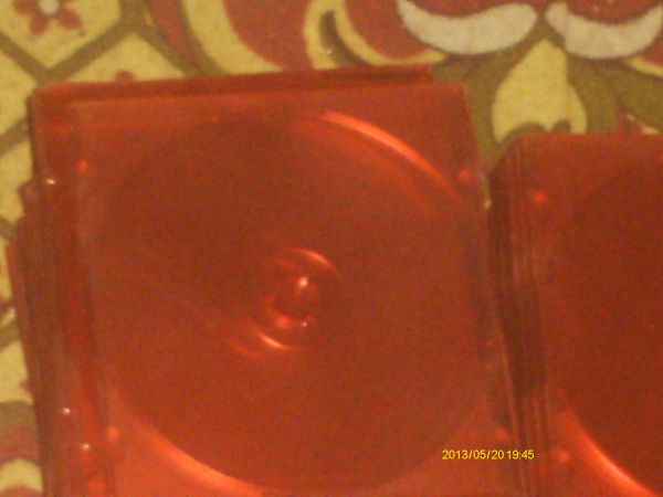 Capa de Cd Vermelho Transparente